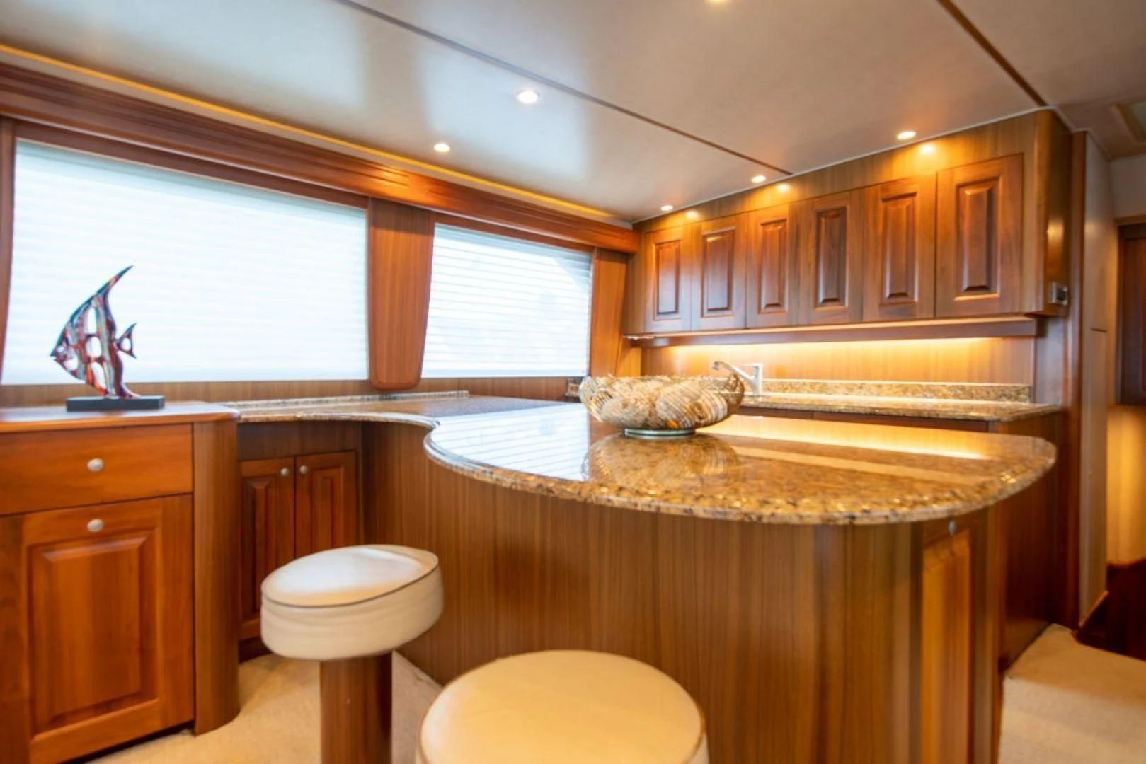 a kitchen with a large island aboard SALT7 Yacht for Sale