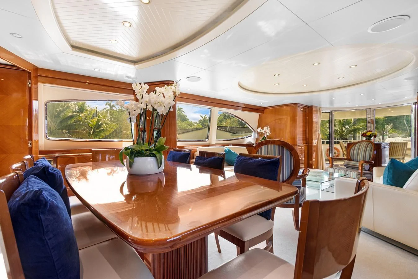 a dining room with a table and chairs aboard CRISTALES Yacht for Sale