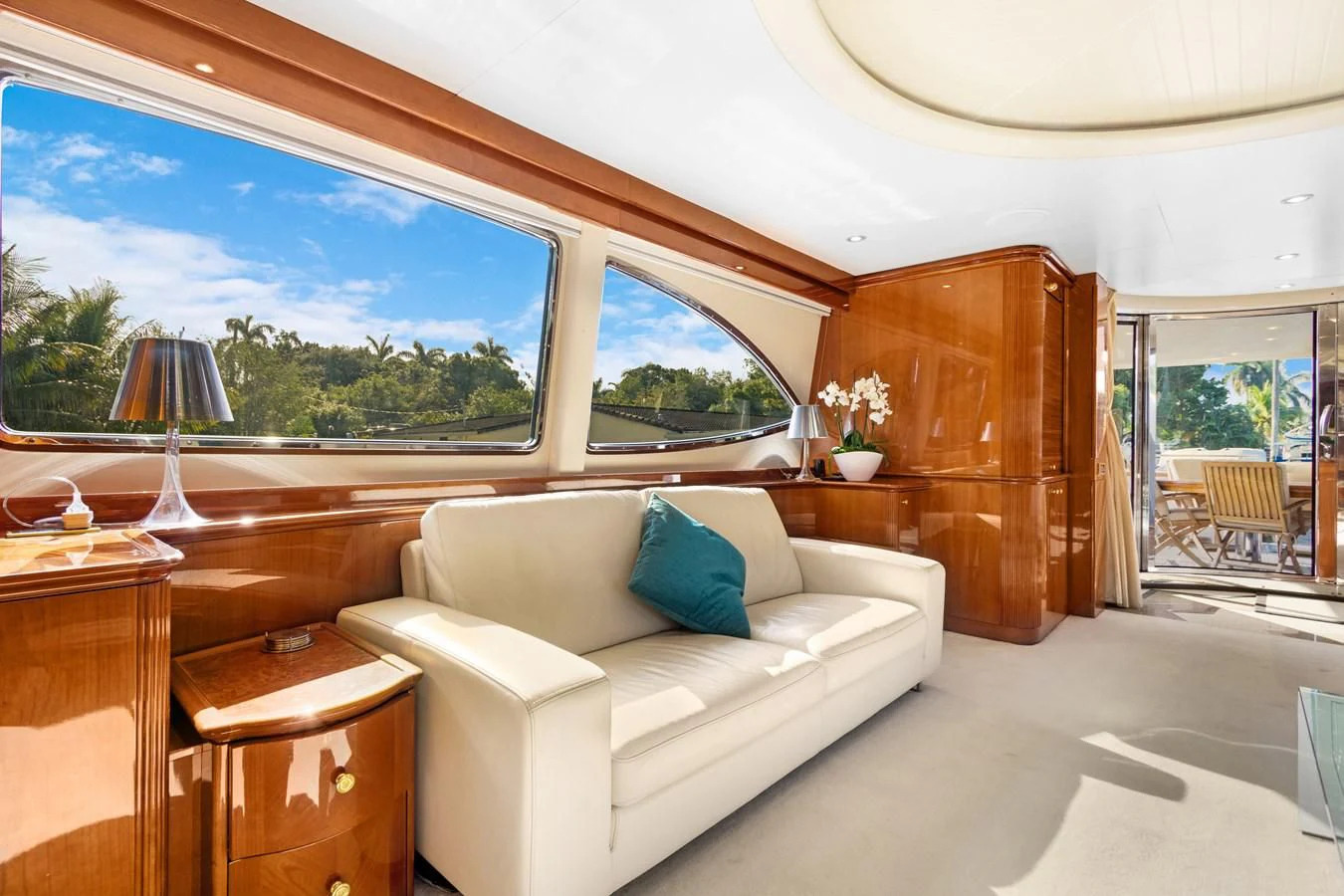 a living room with a large window aboard CRISTALES Yacht for Sale