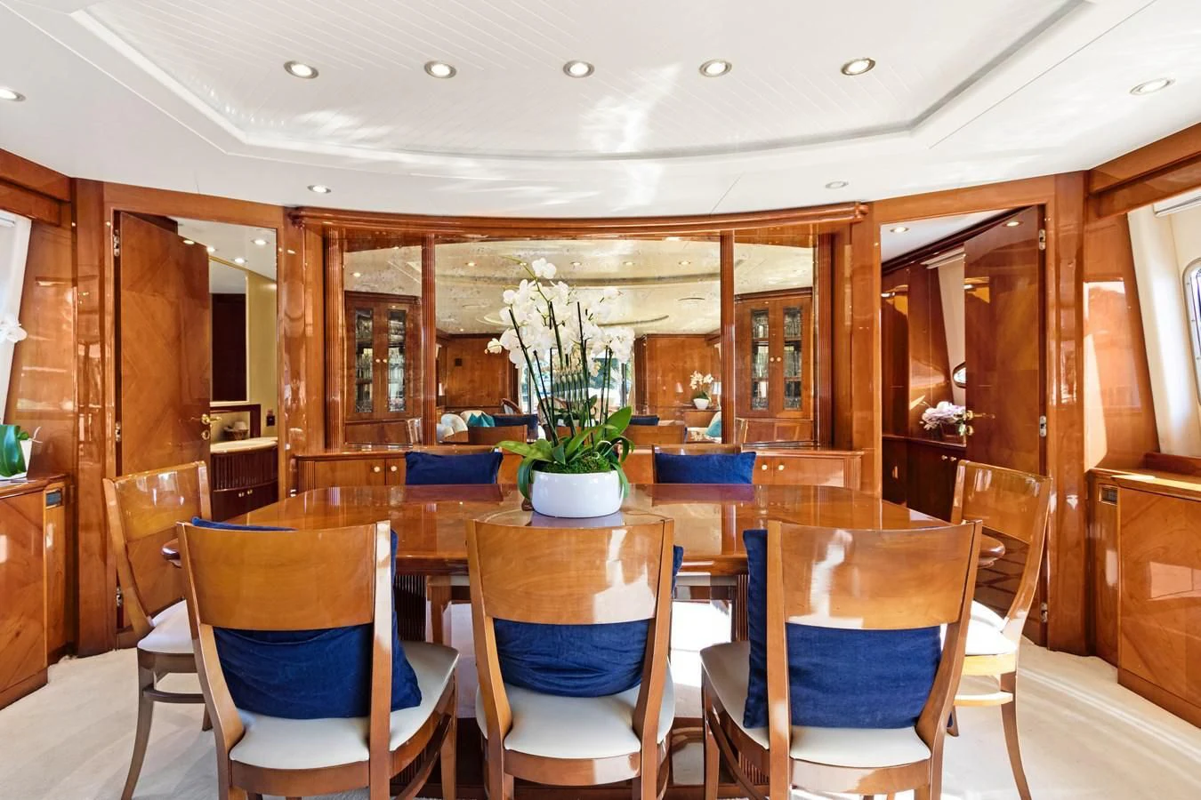 a room with chairs and a table aboard CRISTALES Yacht for Sale