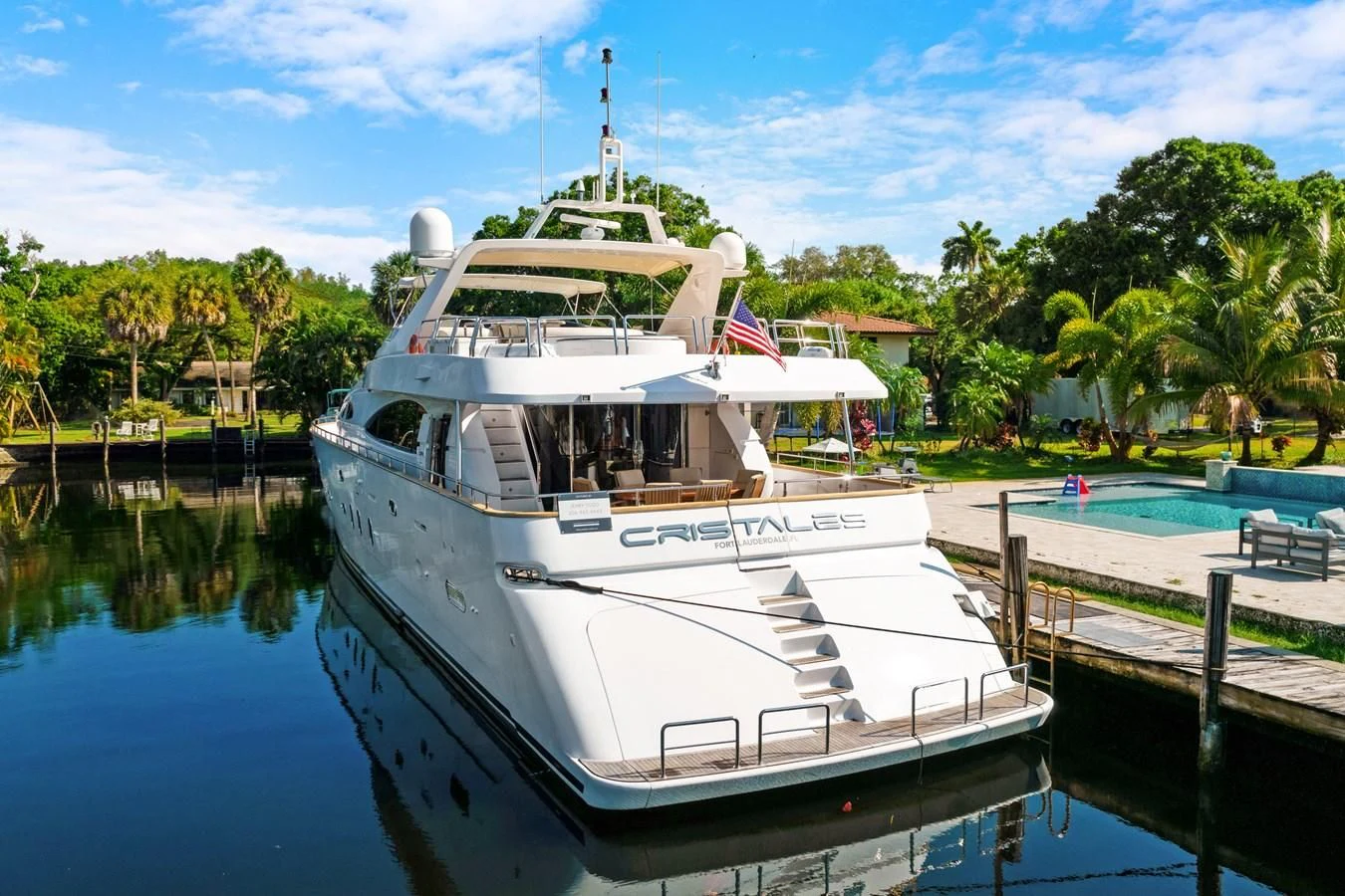 a boat docked at a pier aboard CRISTALES Yacht for Sale