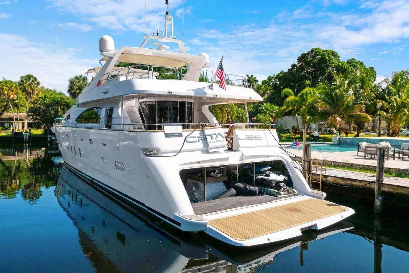 a boat docked at a pier aboard CRISTALES Yacht for Sale