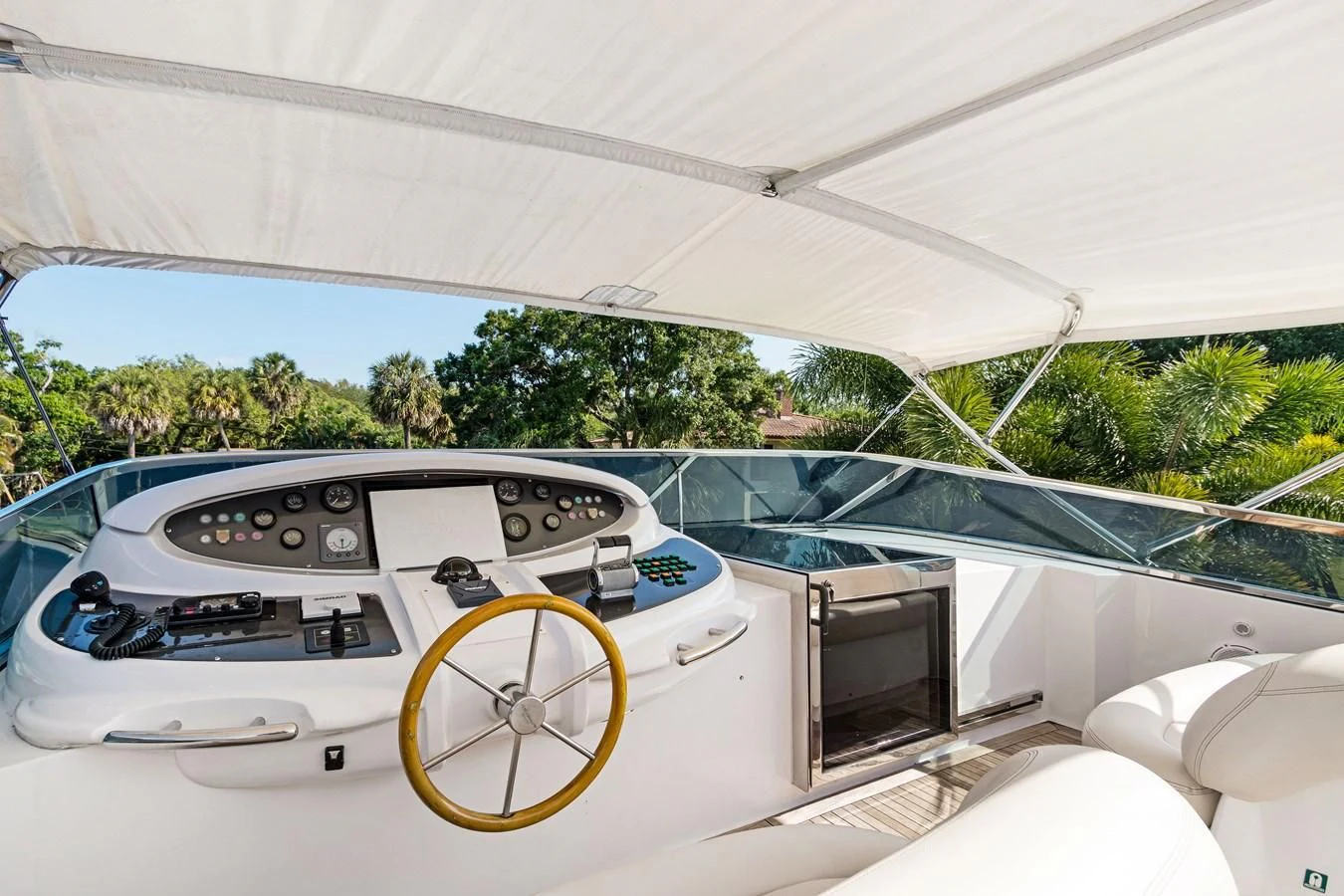 a white car with a yellow rim aboard CRISTALES Yacht for Sale