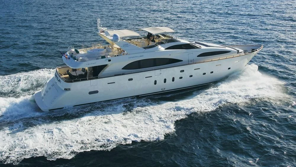 a white yacht on the water aboard CRISTALES Yacht for Sale