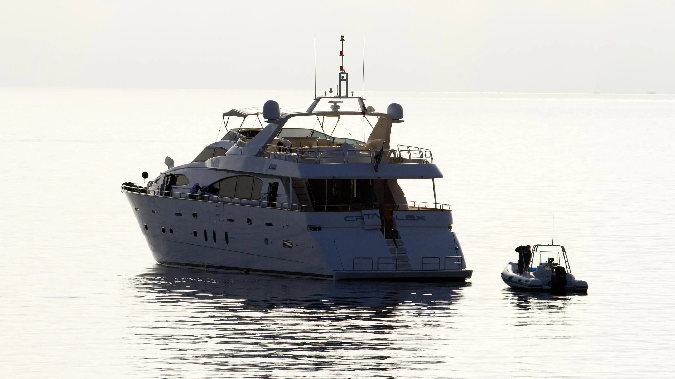 a boat and a boat in the water aboard CRISTALES Yacht for Sale