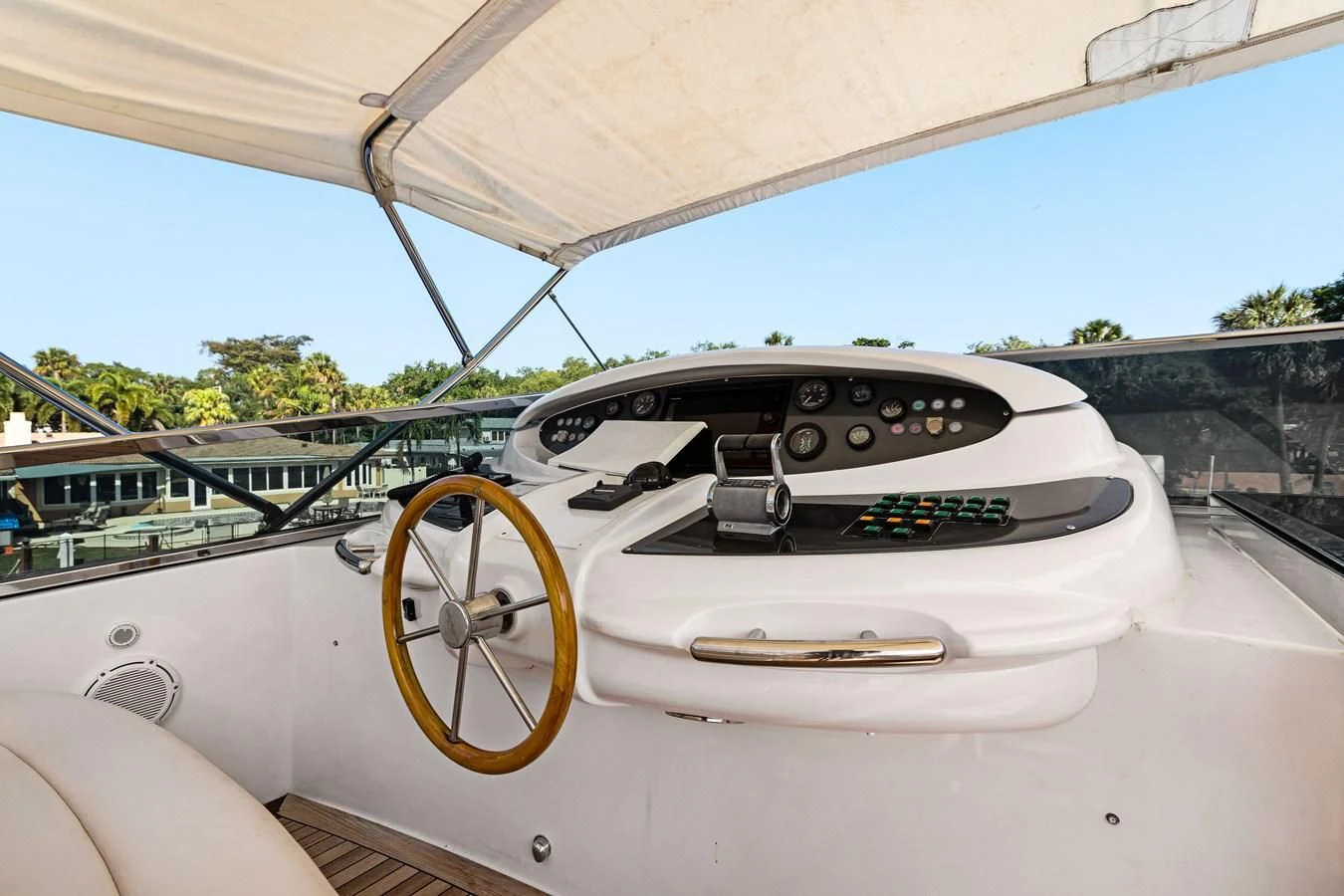 a white car with a door handle aboard CRISTALES Yacht for Sale