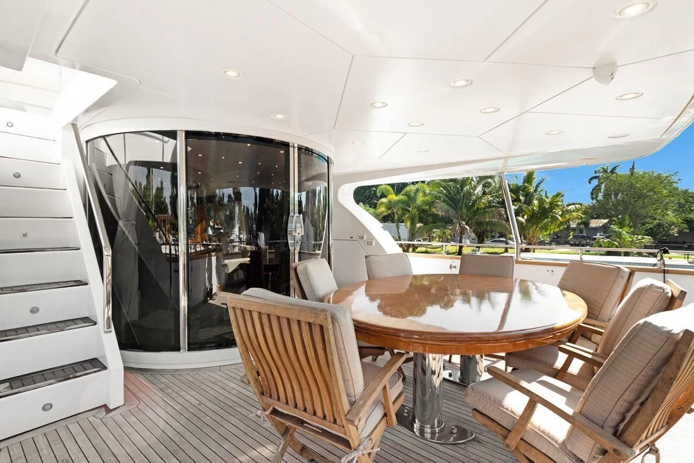 a large dining table in a room aboard CRISTALES Yacht for Sale