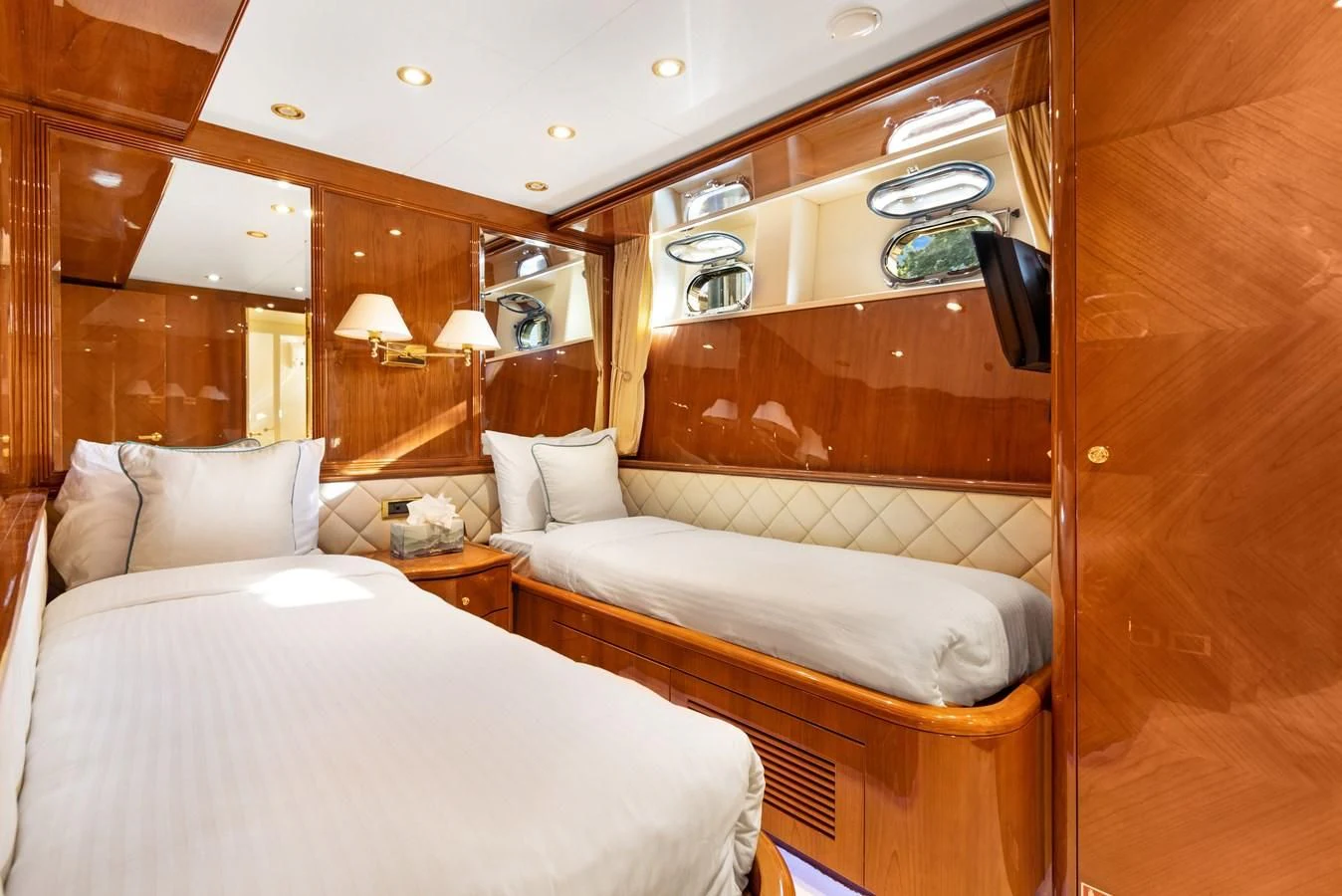 a couple of beds in a hotel room aboard CRISTALES Yacht for Sale