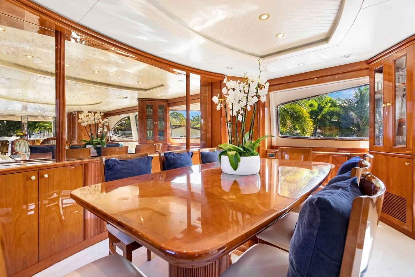 a large kitchen with a table aboard CRISTALES Yacht for Sale