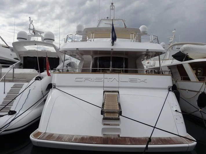 a group of boats in a harbor aboard CRISTALES Yacht for Sale
