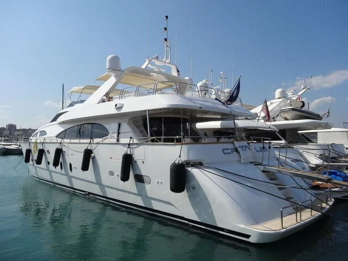 a white yacht in the water aboard CRISTALES Yacht for Sale