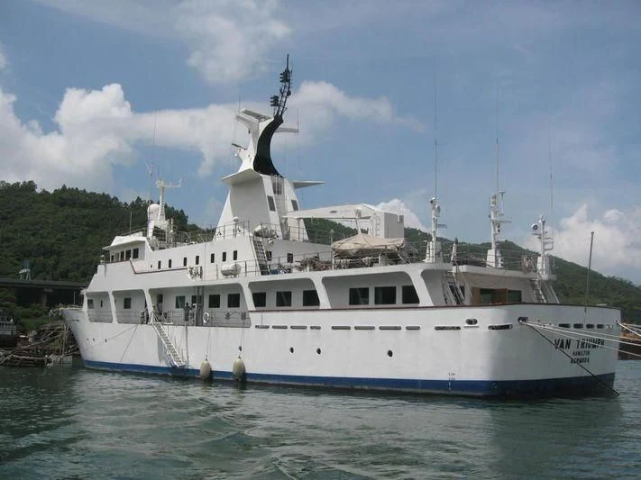 a large white boat in the water aboard VAN TRIUMPH Yacht for Sale