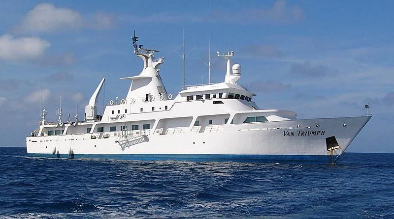 a white yacht in the water aboard VAN TRIUMPH Yacht for Sale