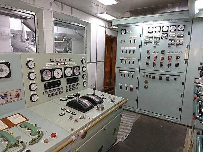 a kitchen with a stove and cabinets aboard VAN TRIUMPH Yacht for Sale
