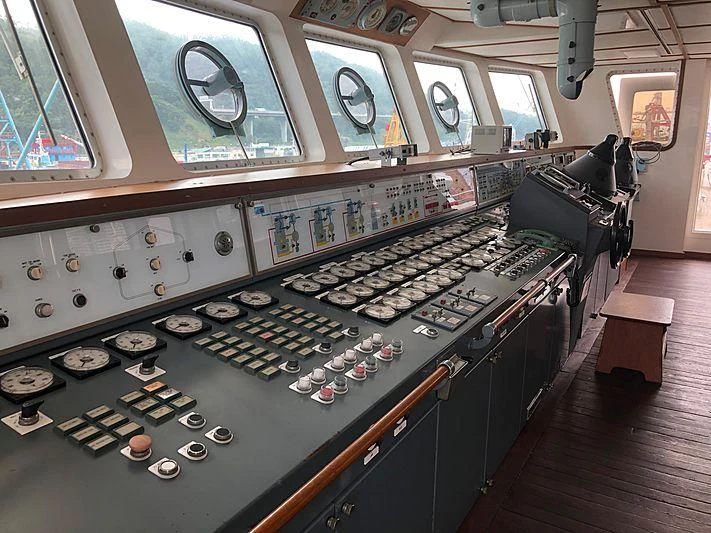 a large kitchen with a large bar aboard VAN TRIUMPH Yacht for Sale