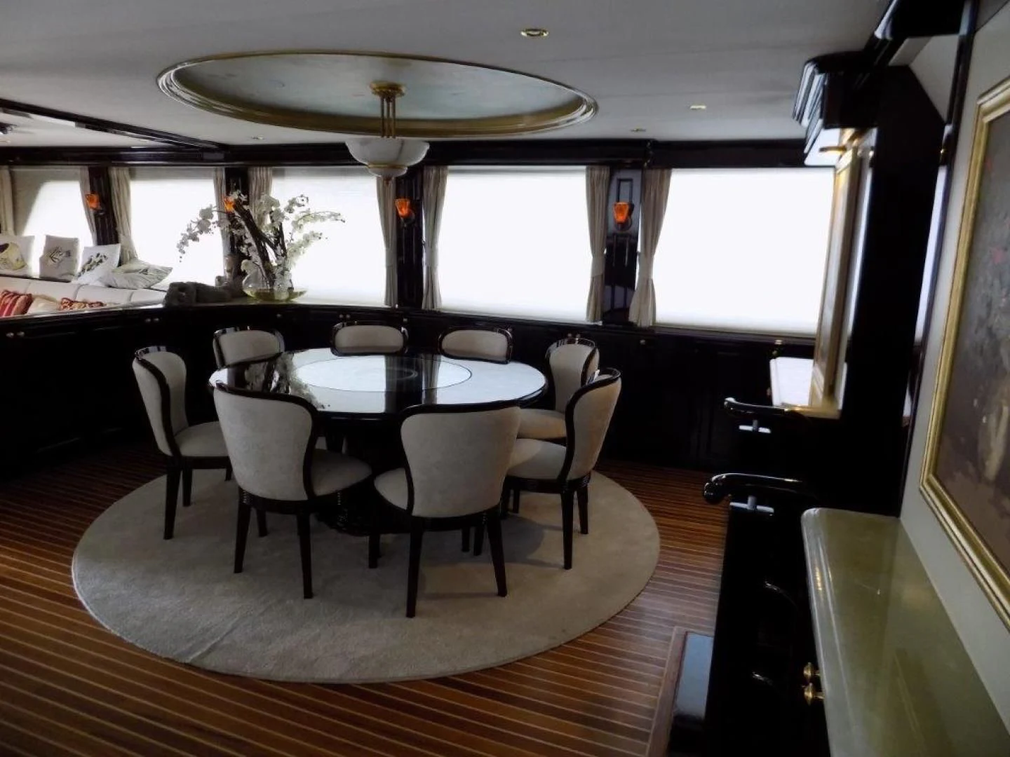 a dining room with a table and chairs aboard BENDIS Yacht for Sale
