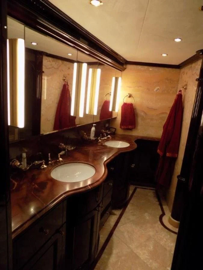 a bathroom with a large mirror aboard BENDIS Yacht for Sale