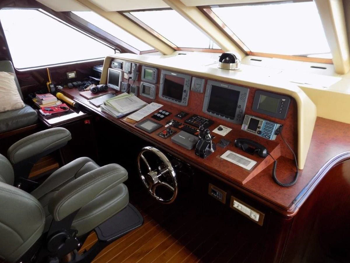 a room with a desk and computer aboard BENDIS Yacht for Sale