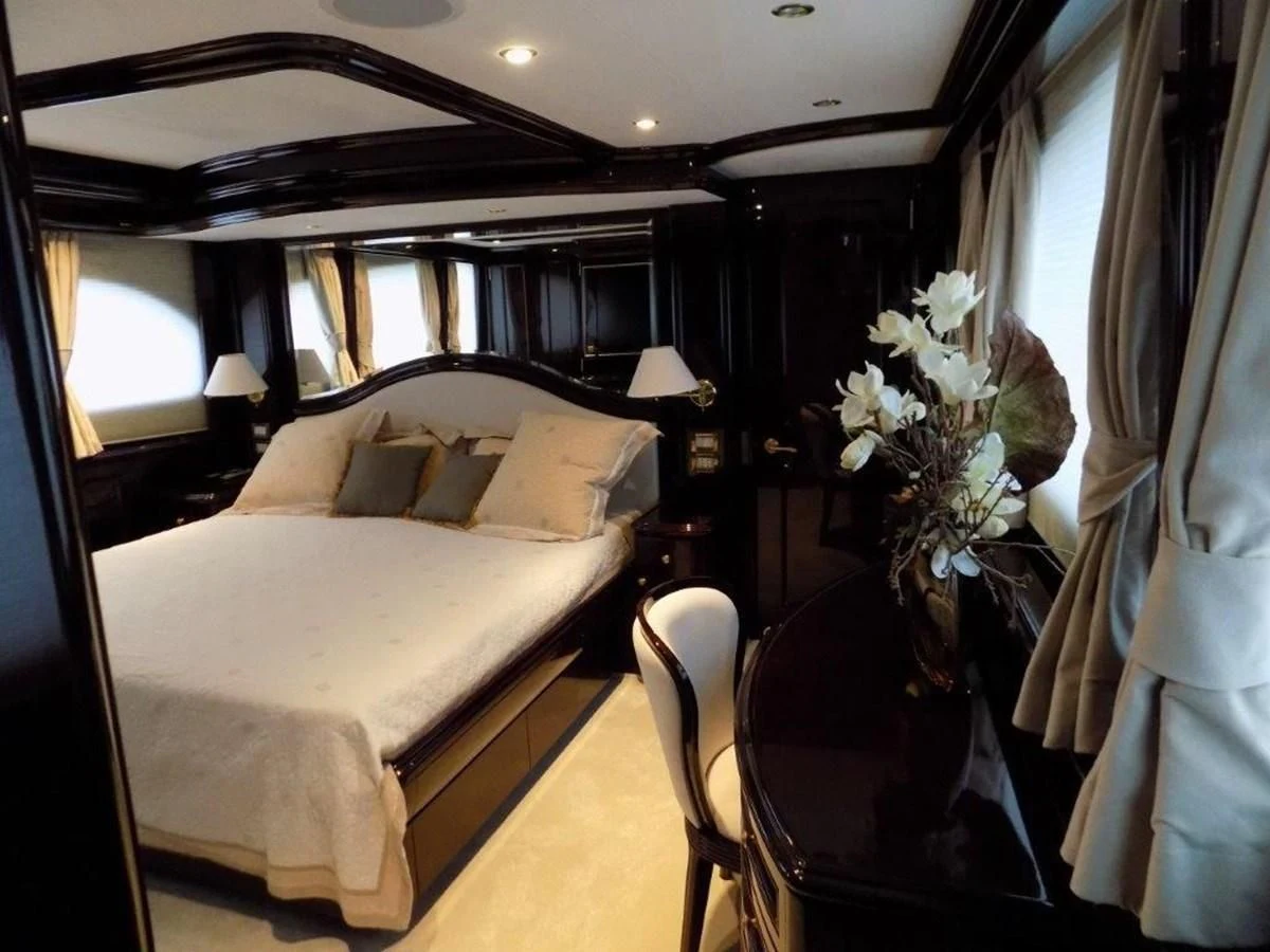 a hotel room with a bed aboard BENDIS Yacht for Sale