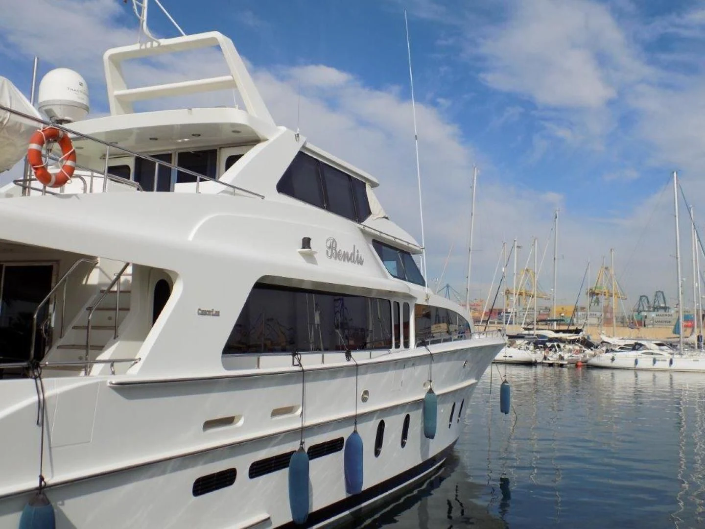 a white yacht in the water aboard BENDIS Yacht for Sale