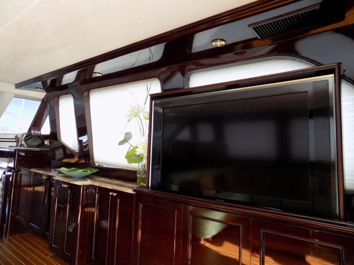 a tv on a stand aboard BENDIS Yacht for Sale