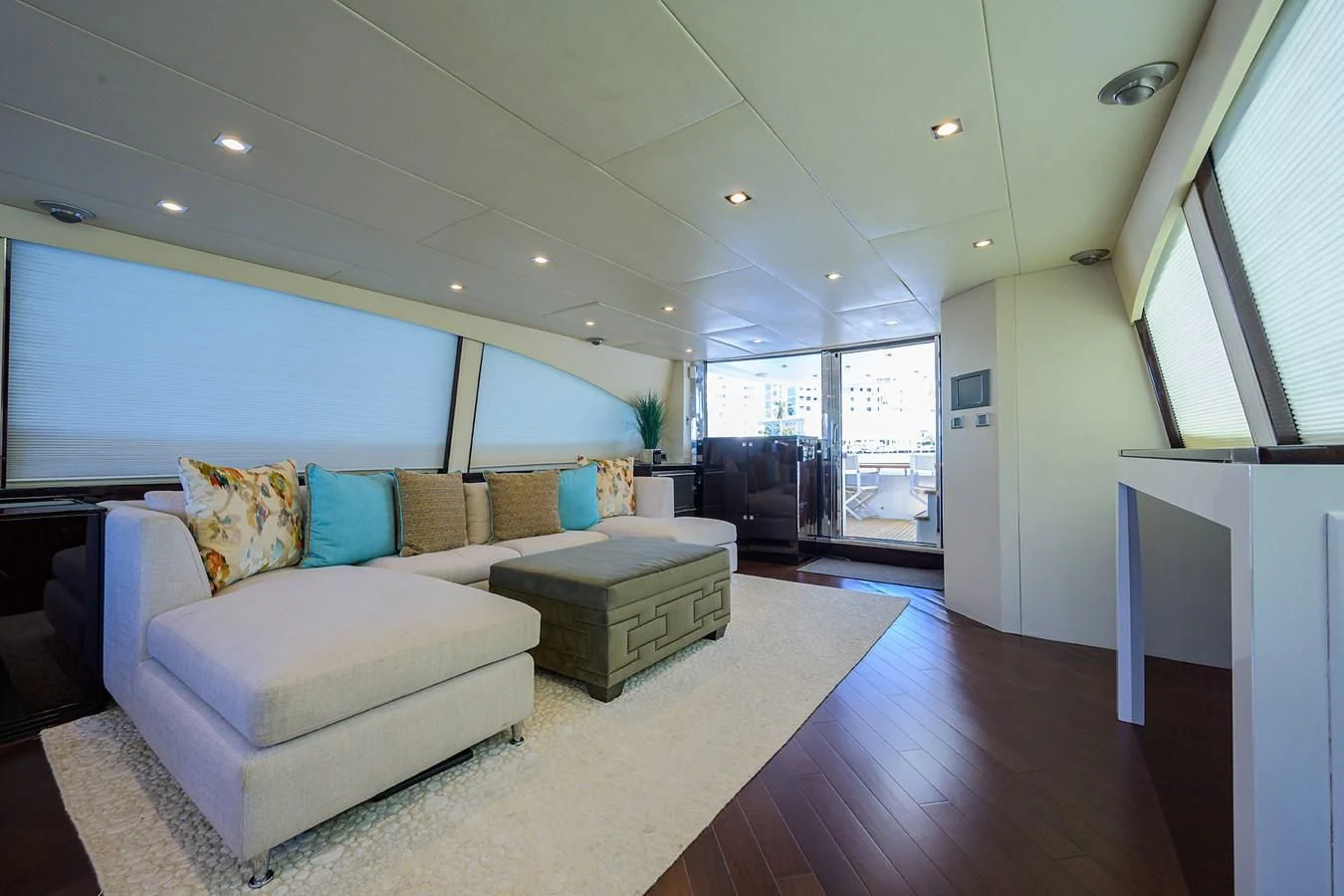 a living room with a large window aboard LADY NADIA Yacht for Sale