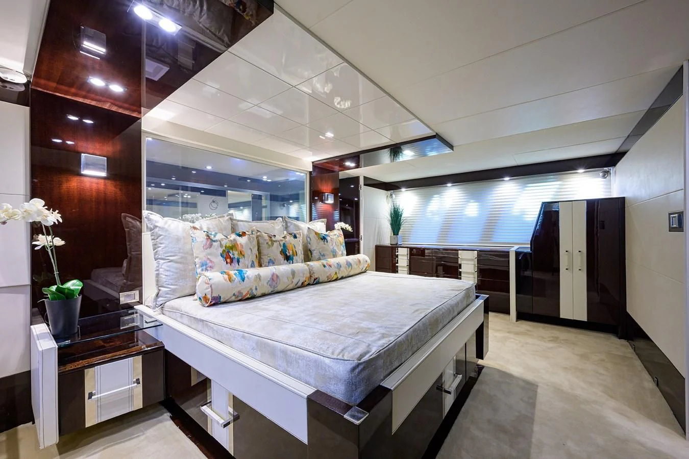 a bed in a room aboard LADY NADIA Yacht for Sale