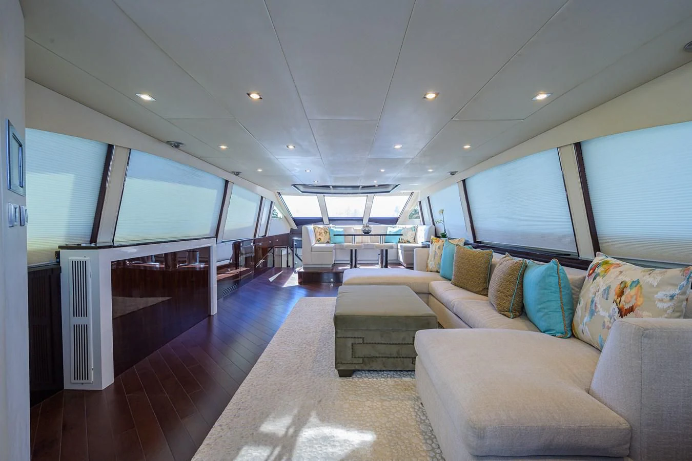 a large living room with a large window aboard LADY NADIA Yacht for Sale
