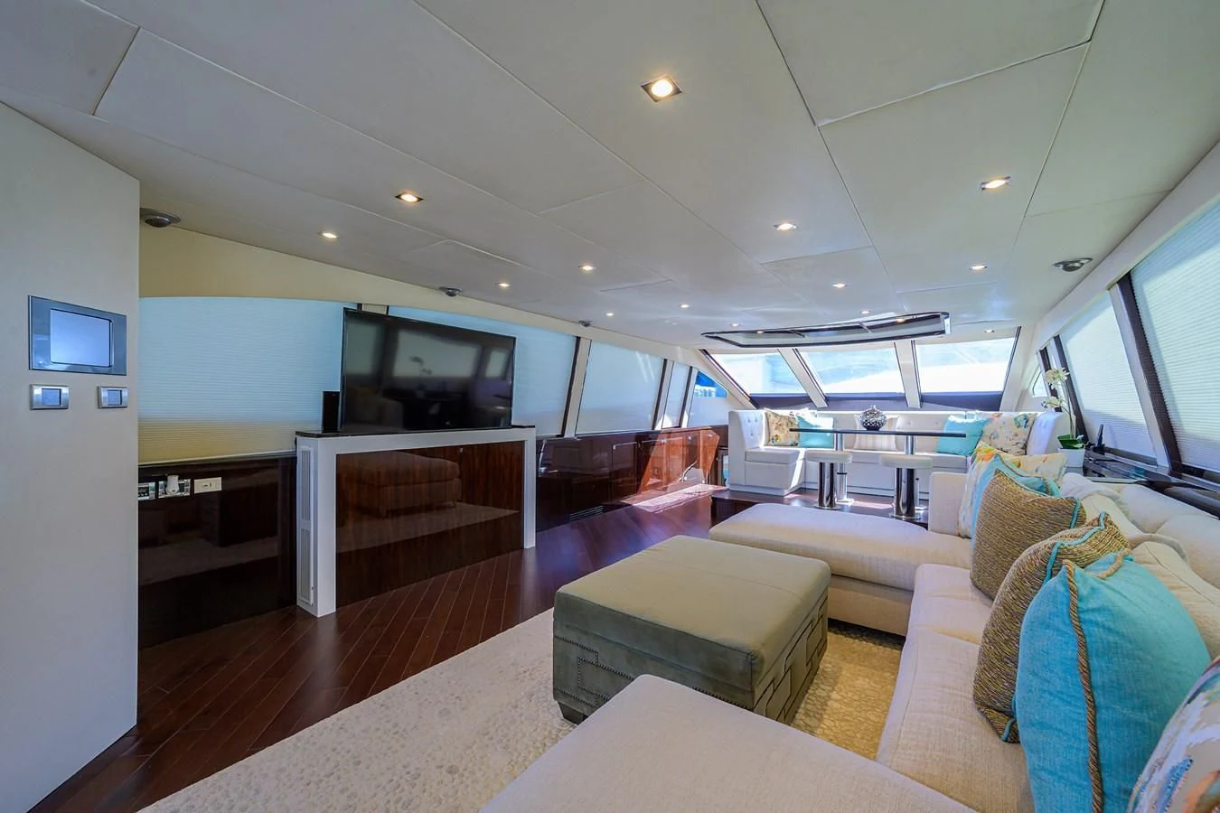 a living room with a large window aboard LADY NADIA Yacht for Sale