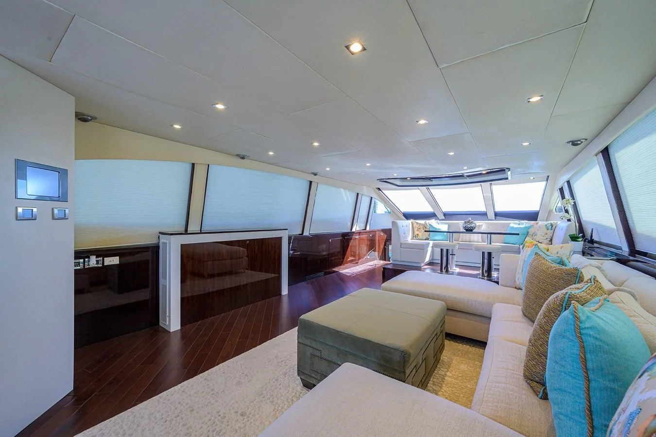 a living room with a large window aboard LADY NADIA Yacht for Sale