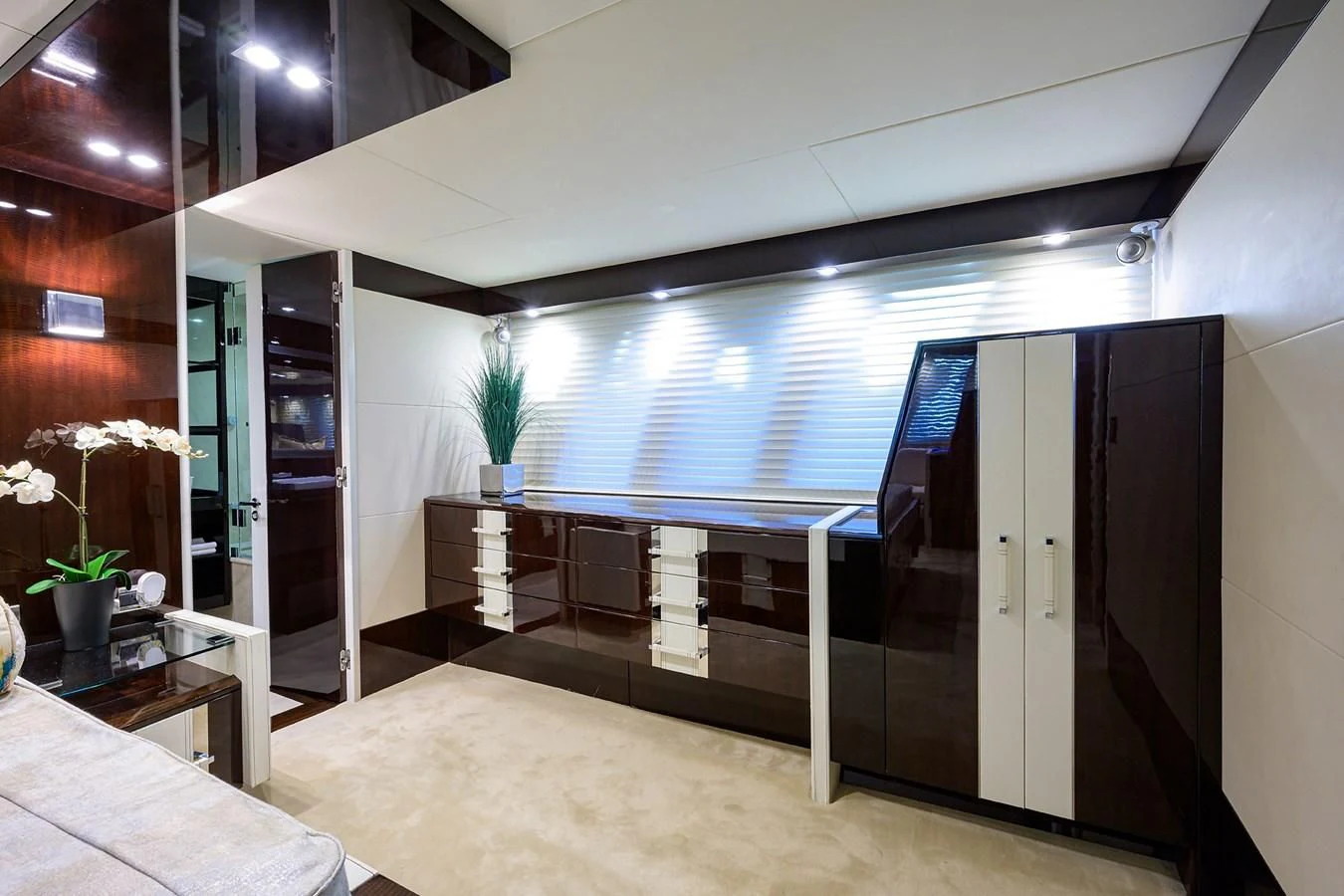 a room with a large glass wall aboard LADY NADIA Yacht for Sale