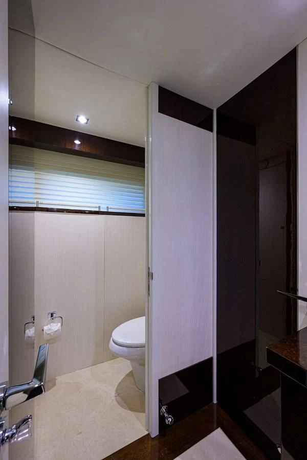 a bathroom with a stand up shower aboard LADY NADIA Yacht for Sale