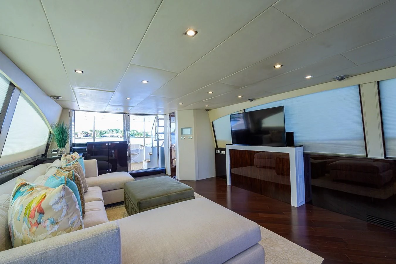 a room with a couch and a tv aboard LADY NADIA Yacht for Sale