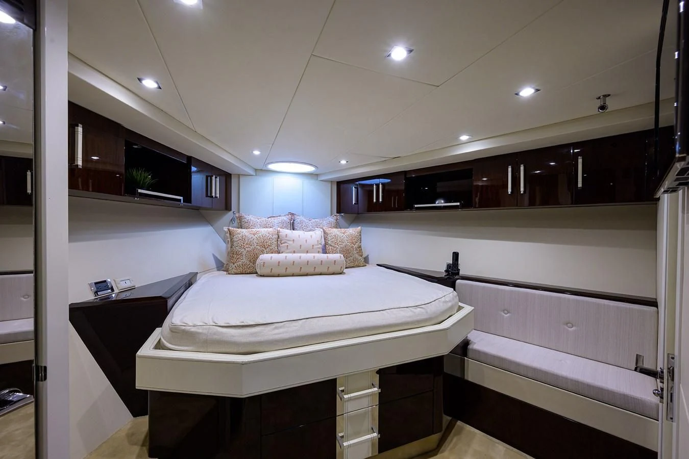 a room with a bed and a desk aboard LADY NADIA Yacht for Sale