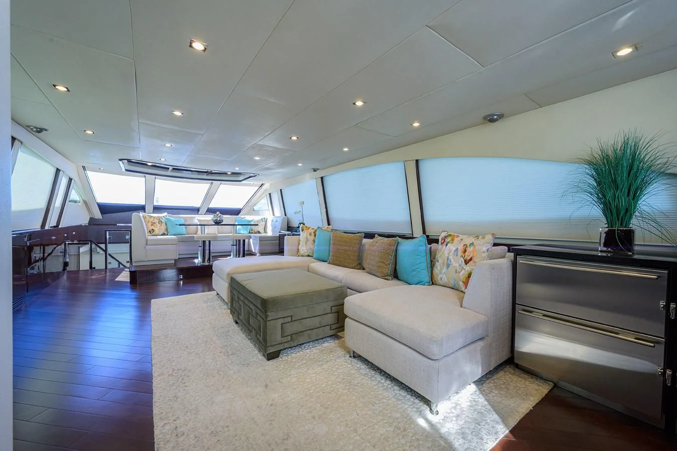 a living room with a couch and a table aboard LADY NADIA Yacht for Sale
