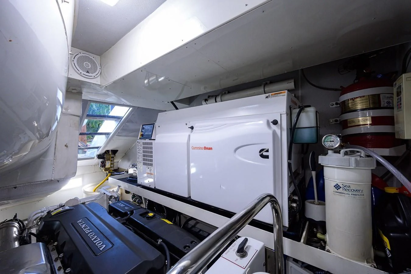 a white machine with a large white cylinder on the side aboard LADY NADIA Yacht for Sale