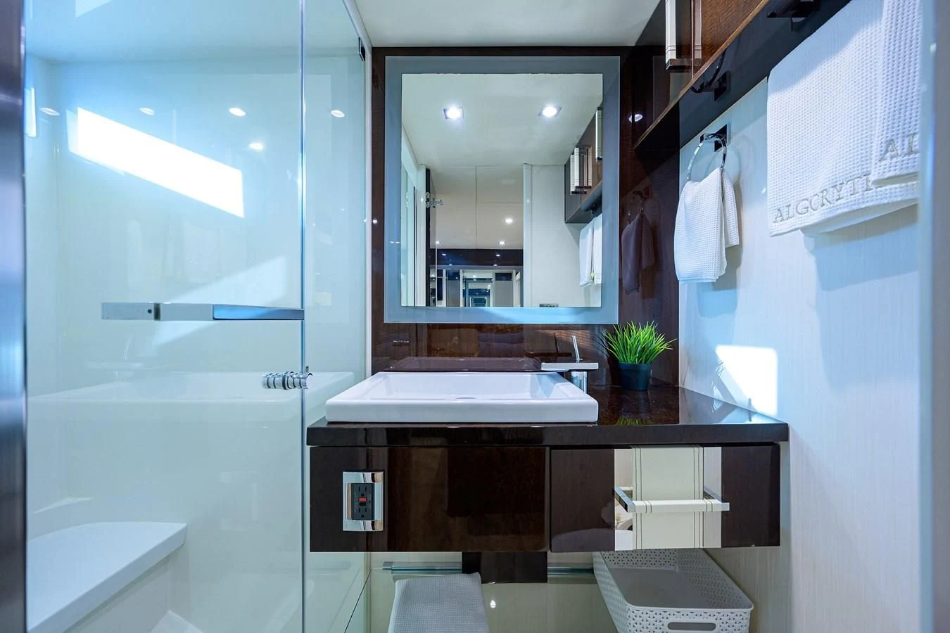 a bathroom with a large mirror aboard LADY NADIA Yacht for Sale