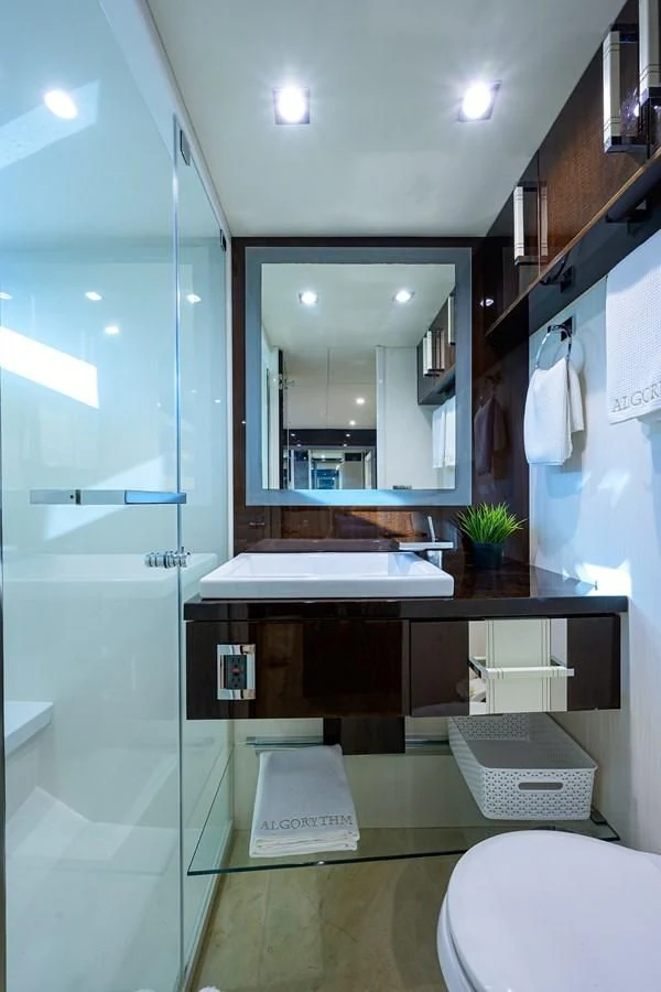 a bathroom with a large mirror aboard LADY NADIA Yacht for Sale