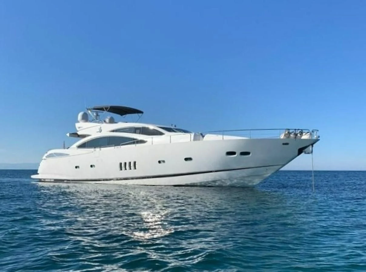 a white yacht in the water aboard JAX OF IBIZA Yacht for Sale