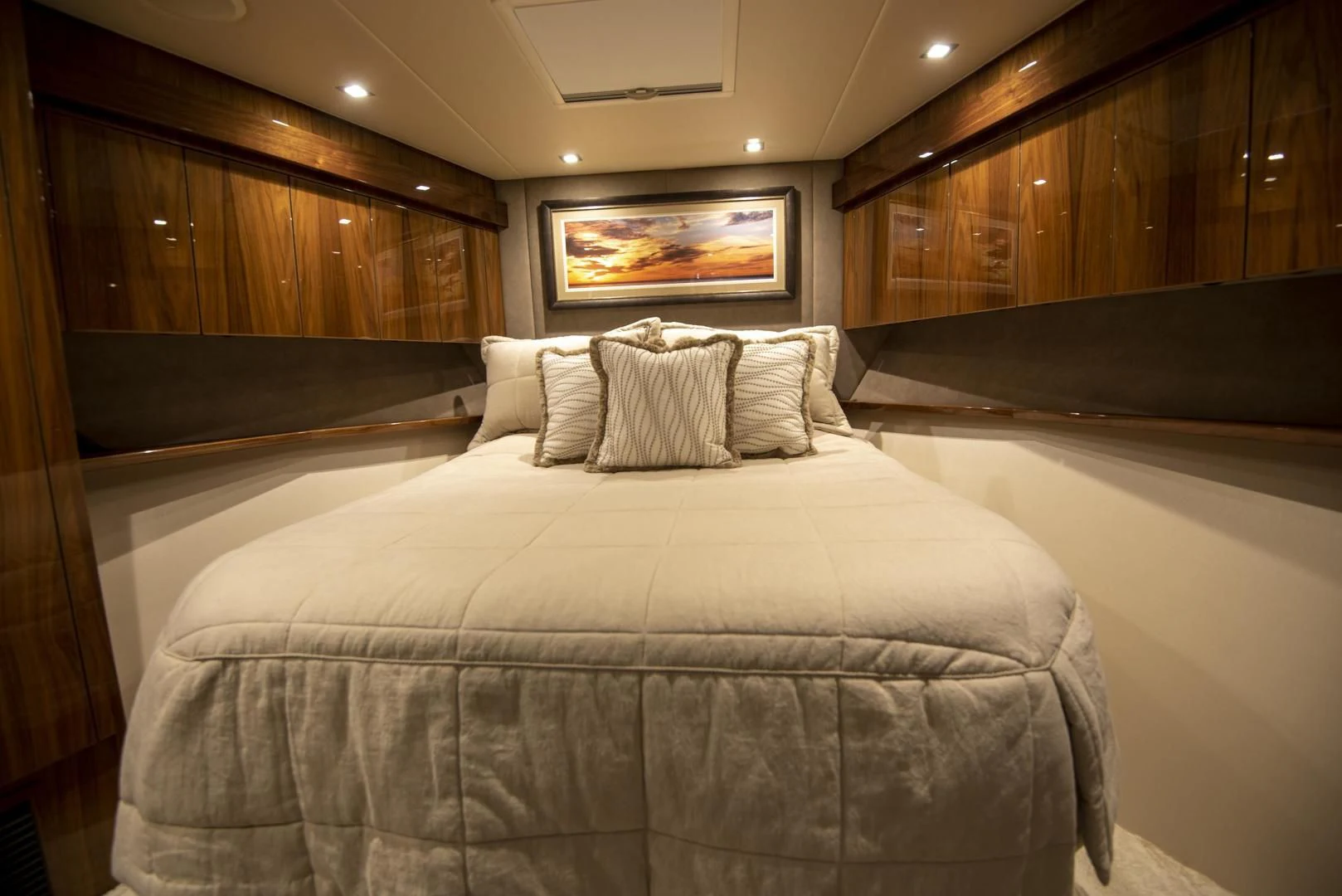 a bed with white sheets aboard TAG TEAM Yacht for Sale