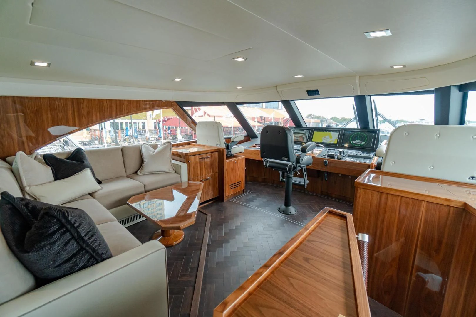 a living room with a large window aboard TAG TEAM Yacht for Sale