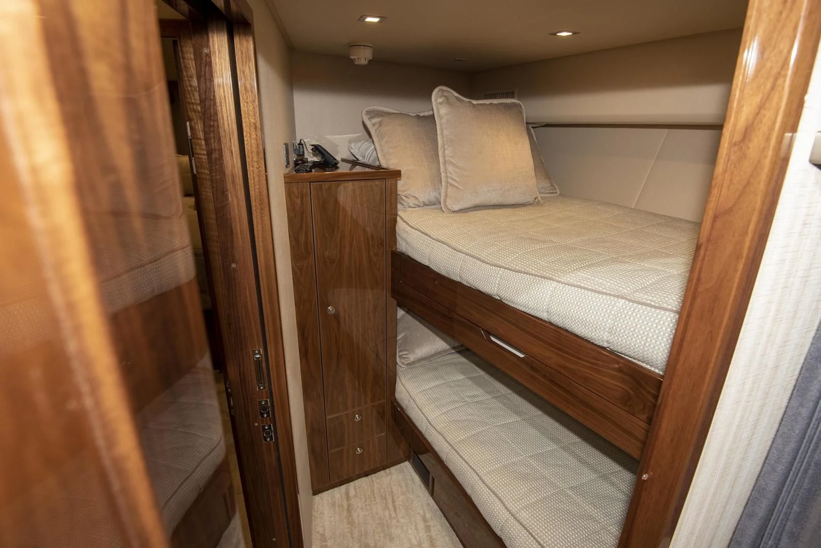 a bed in a room aboard TAG TEAM Yacht for Sale