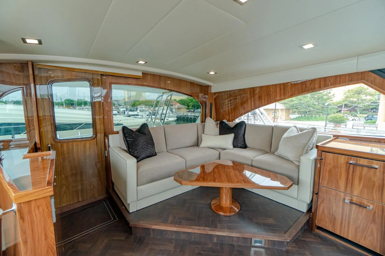 a living room with a couch and a table aboard TAG TEAM Yacht for Sale