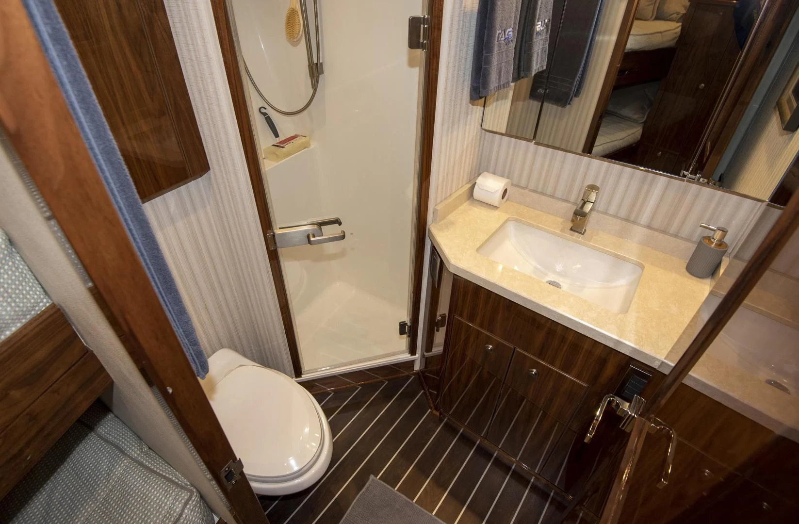 a bathroom with a sink and a toilet aboard TAG TEAM Yacht for Sale