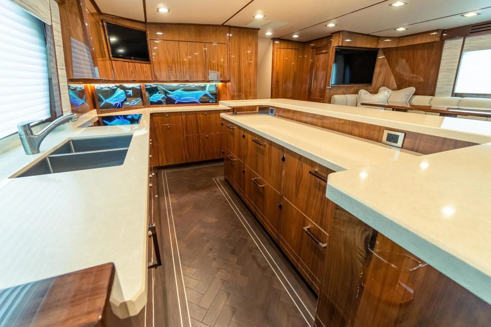 a kitchen with wooden cabinets aboard TAG TEAM Yacht for Sale