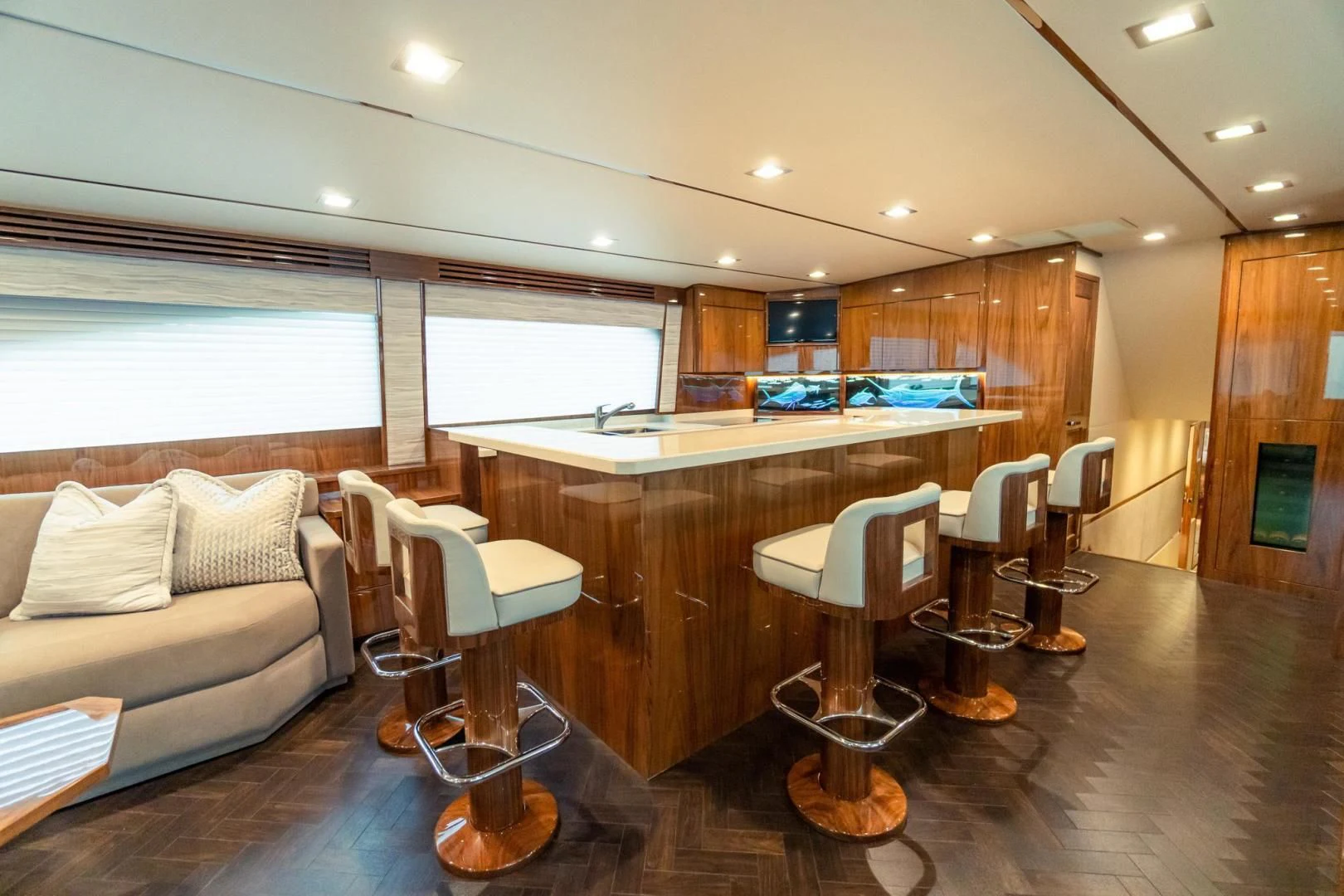a room with a couch and a table and chairs aboard TAG TEAM Yacht for Sale