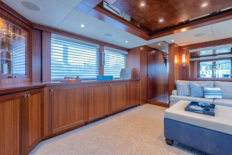 a large room with a bed and a couch aboard RHYTHM'N BLUES Yacht for Sale
