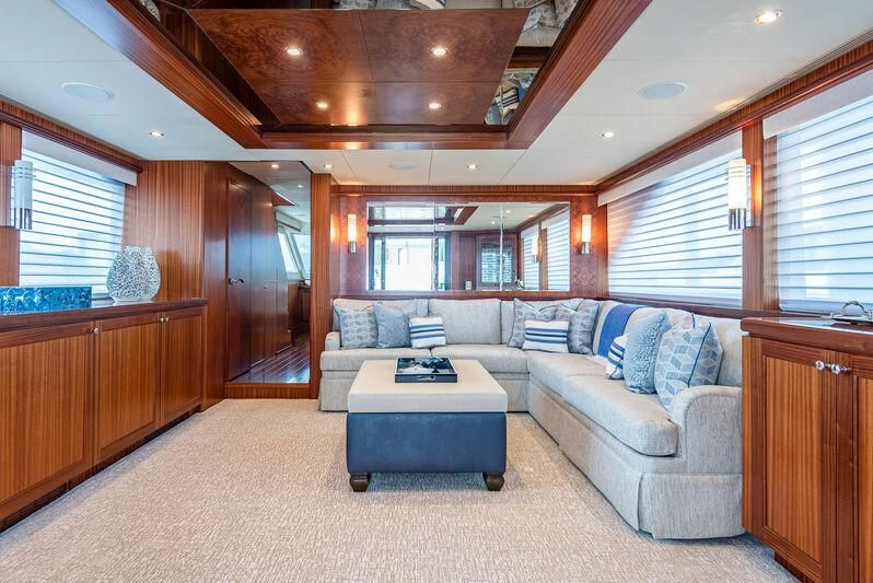 a living room with a couch and a table aboard RHYTHM'N BLUES Yacht for Sale