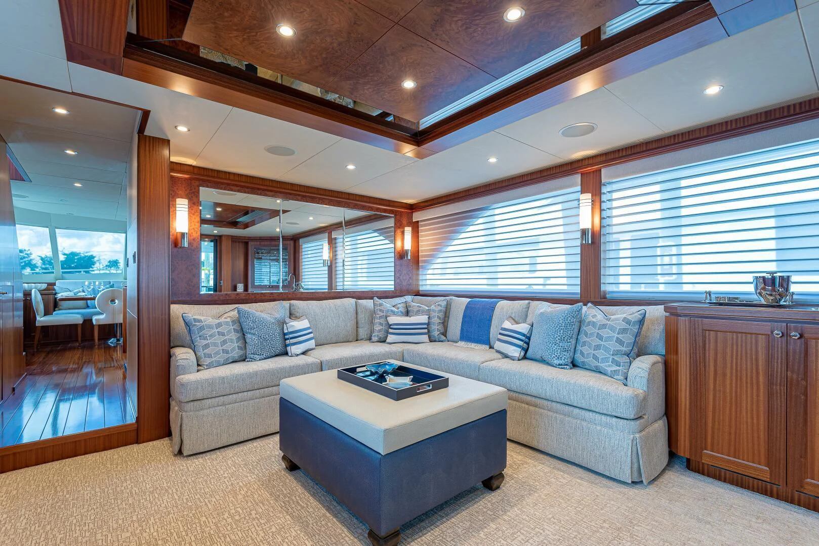 a living room with a couch and a coffee table aboard RHYTHM'N BLUES Yacht for Sale