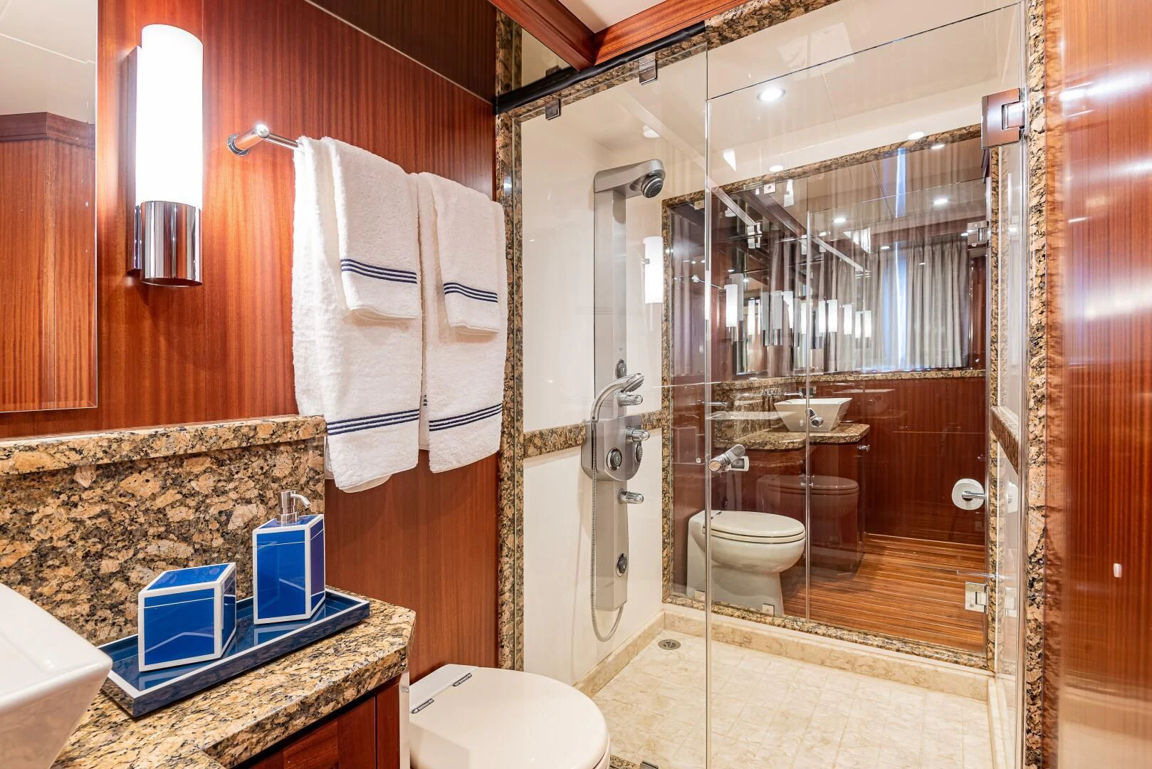 a bathroom with a shower and toilet aboard RHYTHM'N BLUES Yacht for Sale